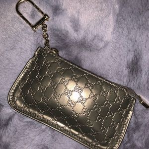 Gunmetal Gucci coin pouch.